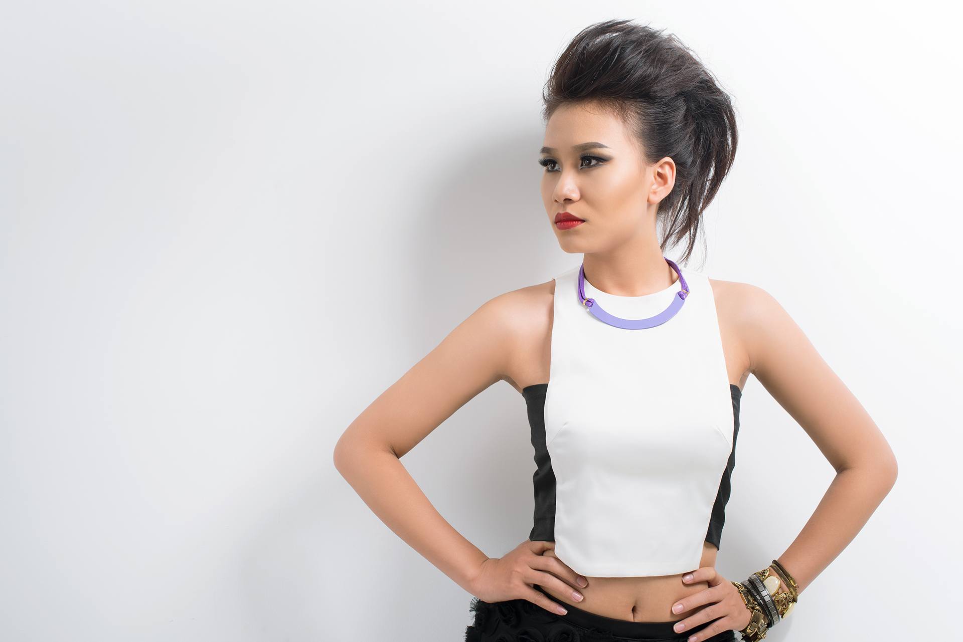 Image of a young woman in vogue with a punk-like hairstyle