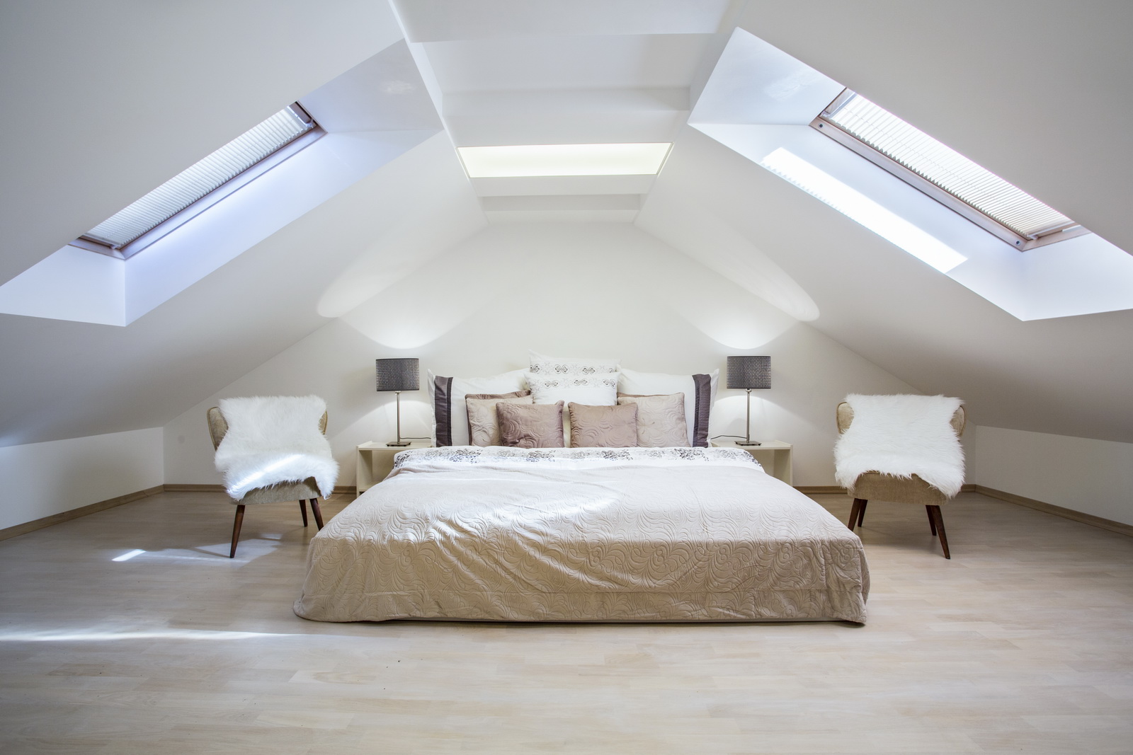 Bright attic bedroom in the apartment