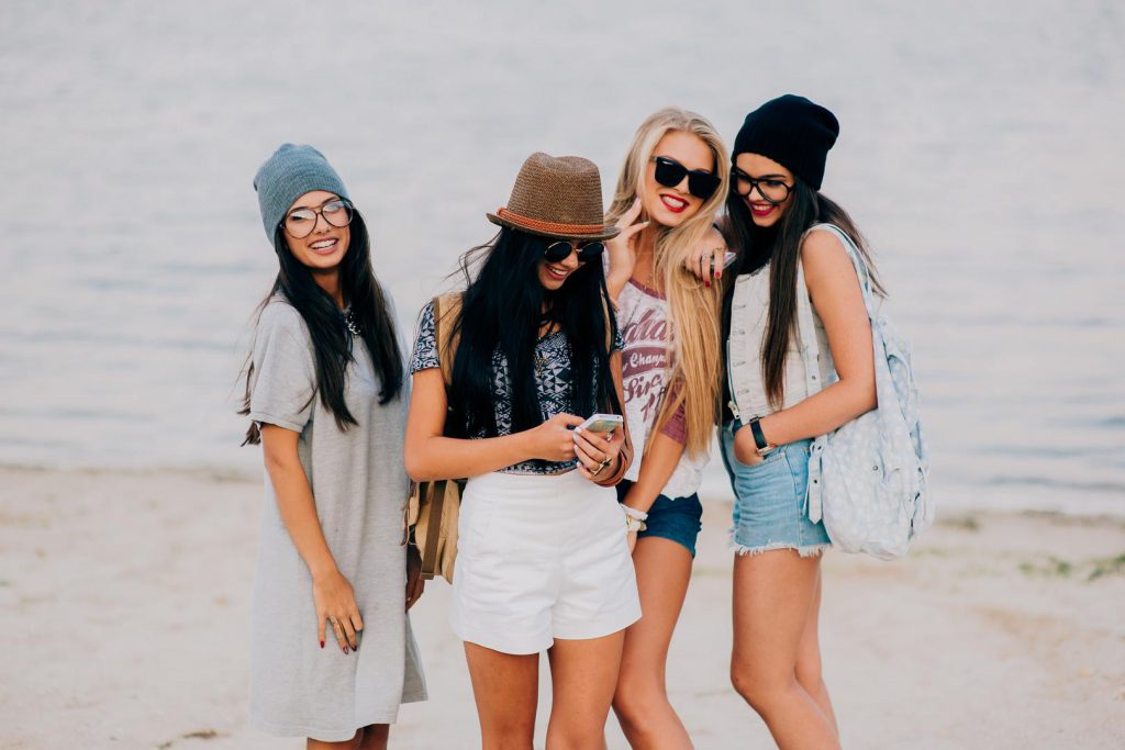 Four young girls on the beach