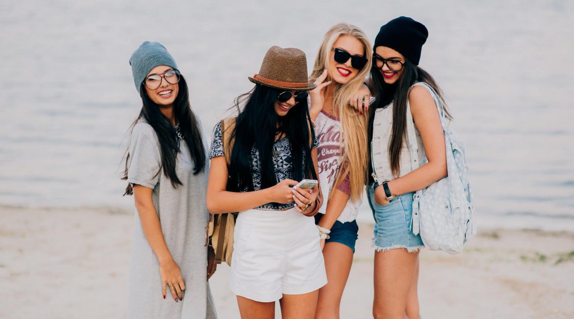 Four young girls on the beach
