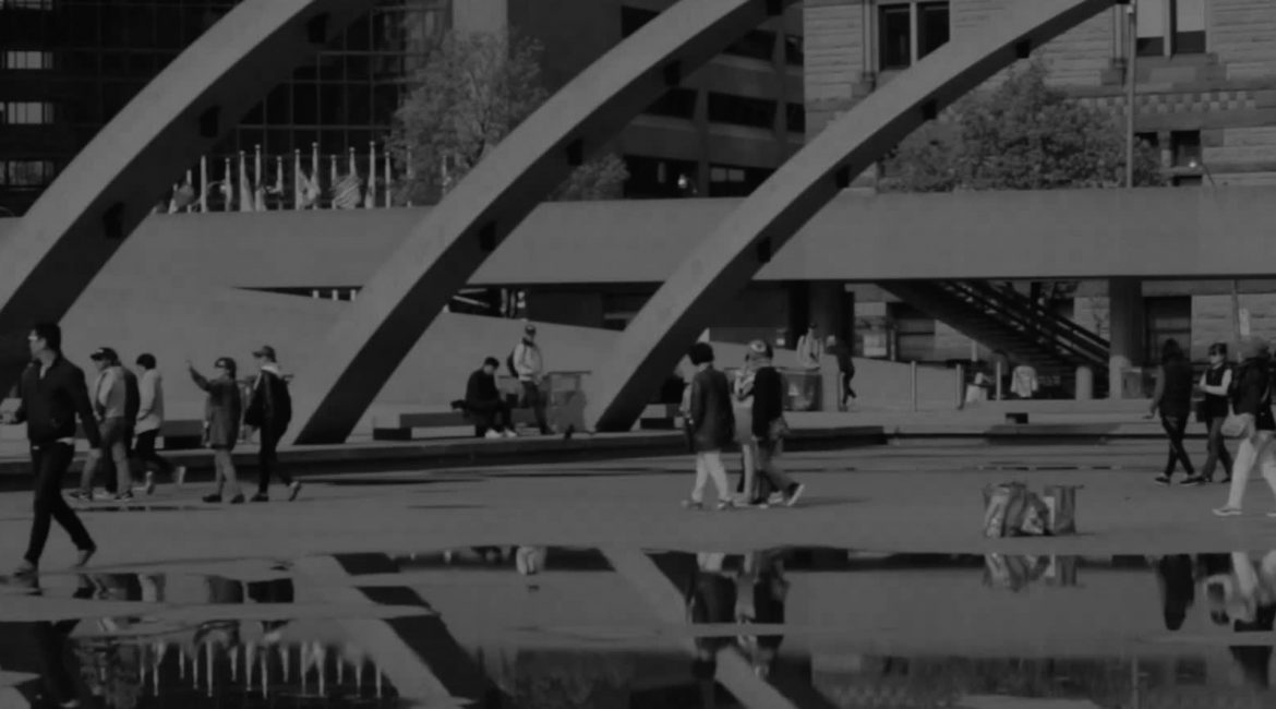 People walk down the street